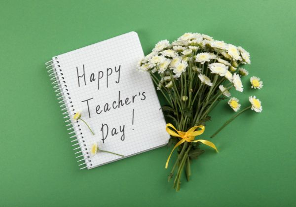 A curated selection of thoughtful Teacher's Day gifts arranged beautifully, symbolizing appreciation and respect for teachers.
