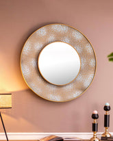 Elegant Moroccan-style filigree circles wall mirror featuring a handcrafted metal frame with a unique distressed finish, perfect for adding a touch of artisan elegance to home decor.