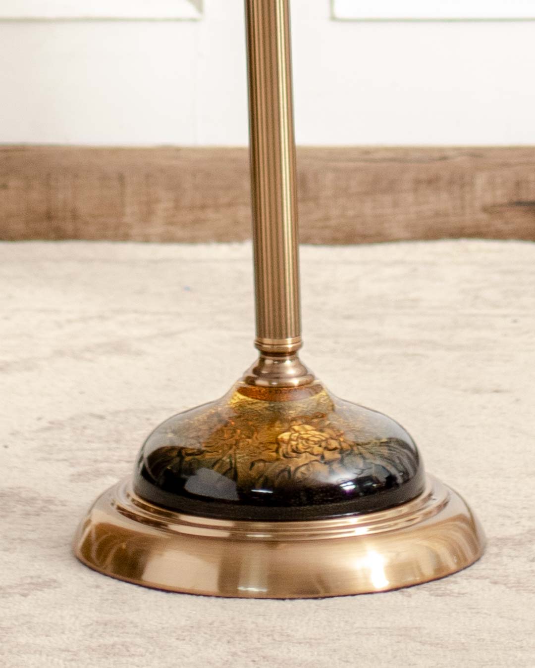 Sturdy base of 'Kensington' floor clock with intricate design for a regal and sturdy home timepiece.