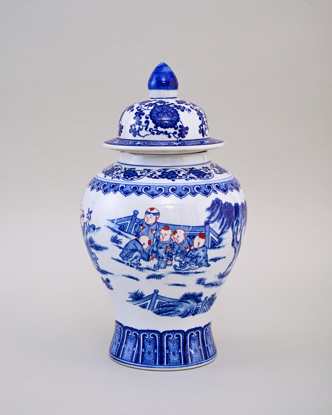 Blue and White Children Motif Temple Jar