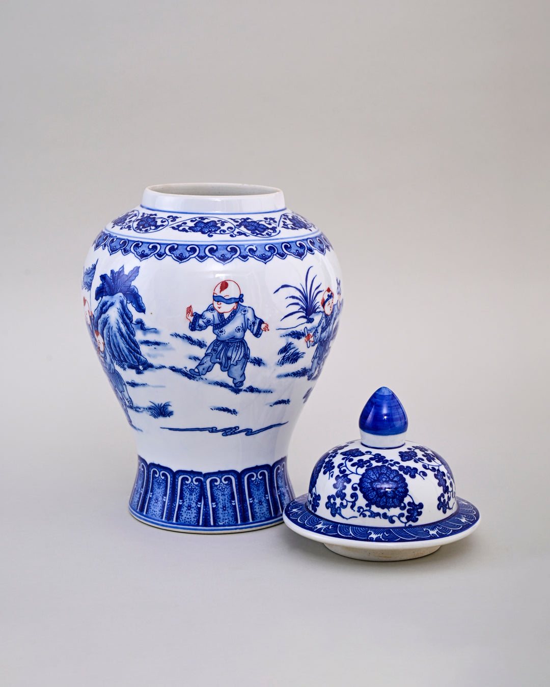 Blue and White Children Motif Temple Jar