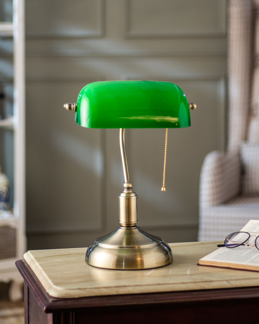 Vintage-inspired Classic Banker's Lamp with adjustable green shade for focused lighting.