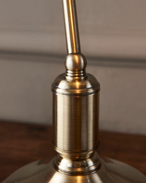 Iconic Banker's Lamp with  brass base, a timeless office accessory.