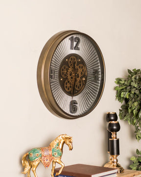 Side view of a vintage royal wall clock with intricate gear design, enhancing traditional home interiors. 