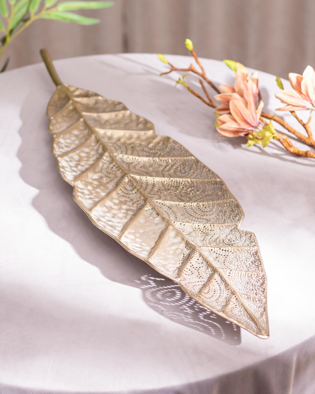 Metal leaf serving platter with gilded finish