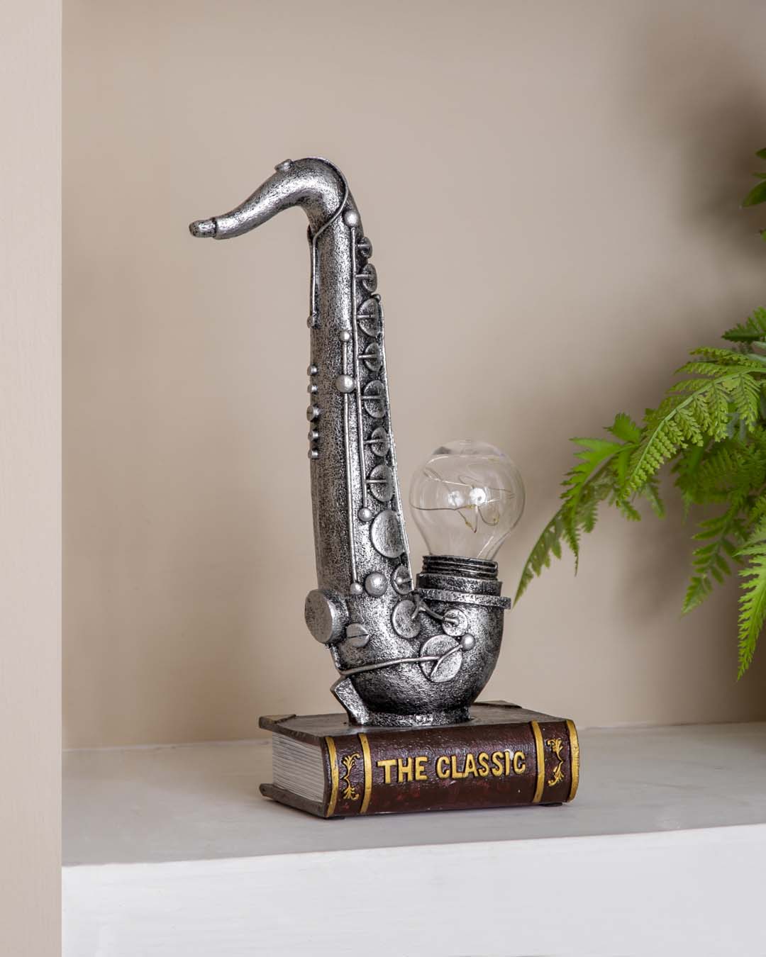Saxophone Placed On Book Stand - The Decor Kart 