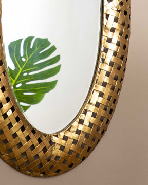 Contemporary Darius wall mirror with a distinctive golden checkered frame, adding a modern twist to classic decor.