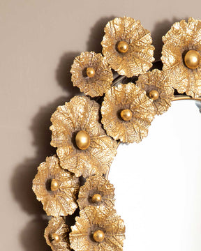 Close-up of the Leafy Radiance mirror showcasing detailed metal leaf embellishments.