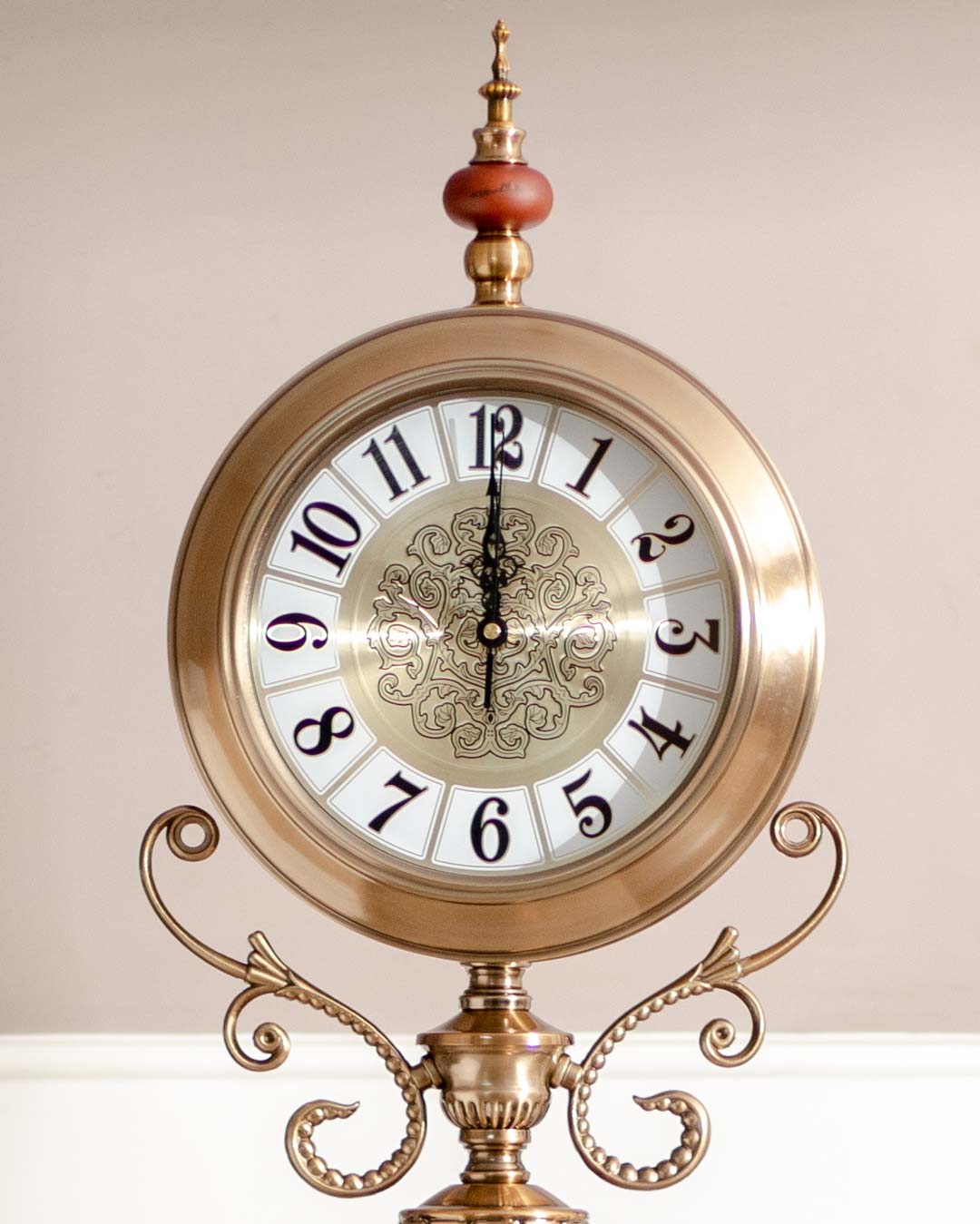Tall 'Seville' standing clock with ornate gold finish and Roman numerals, perfect as a living room centerpiece.