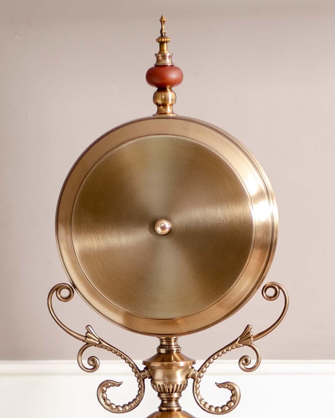 Stately 'Seville' red floor clock with a gold ornate clock face, an exquisite decor item for refined tastes.
