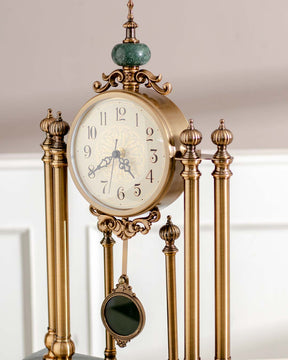 Classic 'Villa Vista' pendulum mantle clock with gold finishing, Roman dial, and decorative columns for an elegant look. 