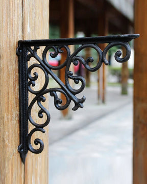Antique-inspired decorative cast iron shelf bracket with intricate detailing for vintage home interiors.