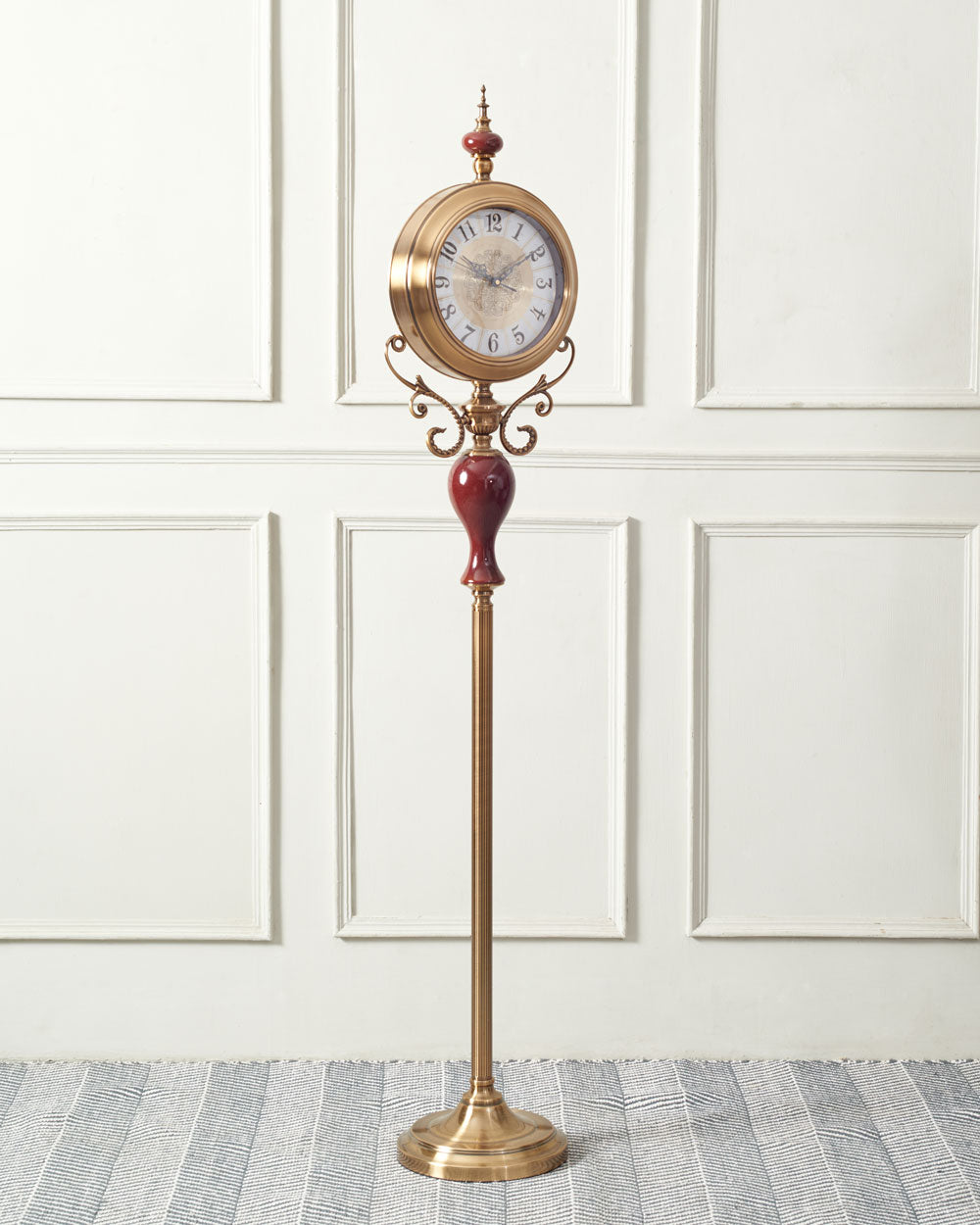 Grand 'Seville' decorative floor clock with red column and gold accents, blending with opulent home themes.