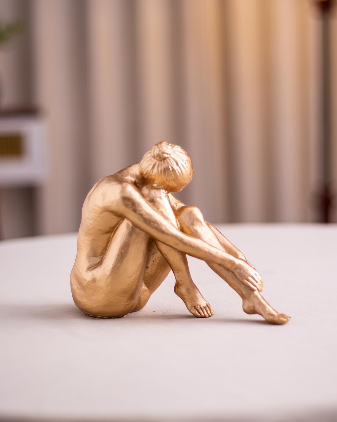 Artistry Sitting Women Figurine