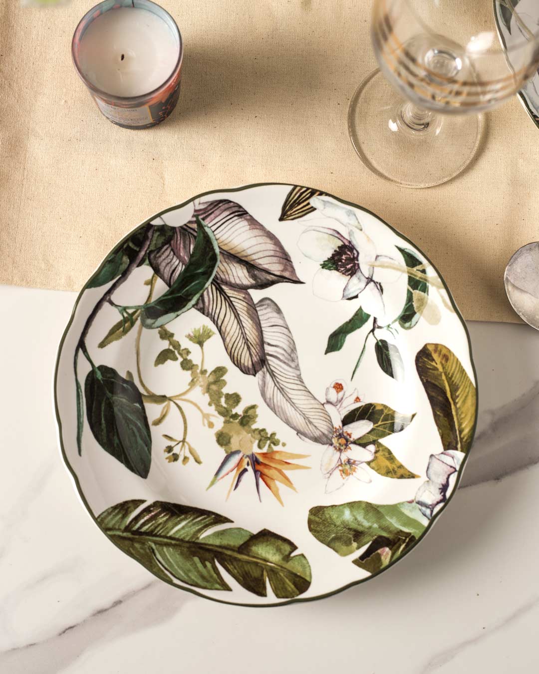 Borneo White Quarter Plate with exotic leaf design displayed on a natural table setting, blending effortlessly with modern home decor.